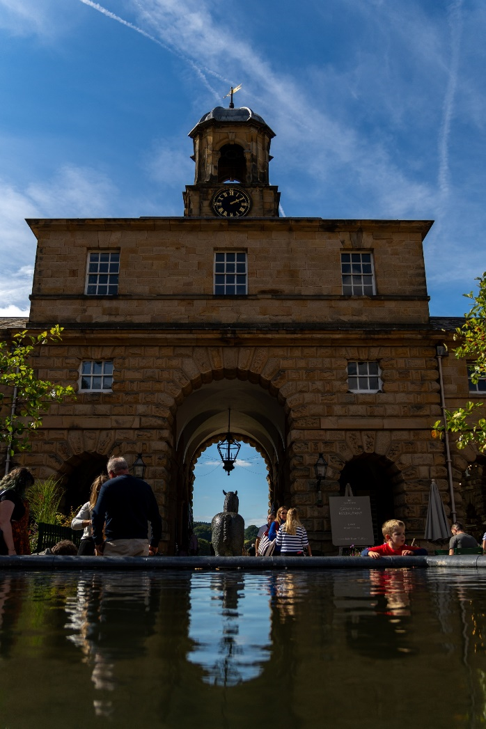 Busy image of a clock tower at Chatsworth House